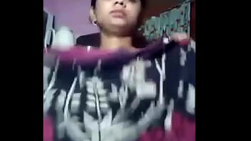 Shy Indian Beauty Reveals Her Massive Melons On Camera